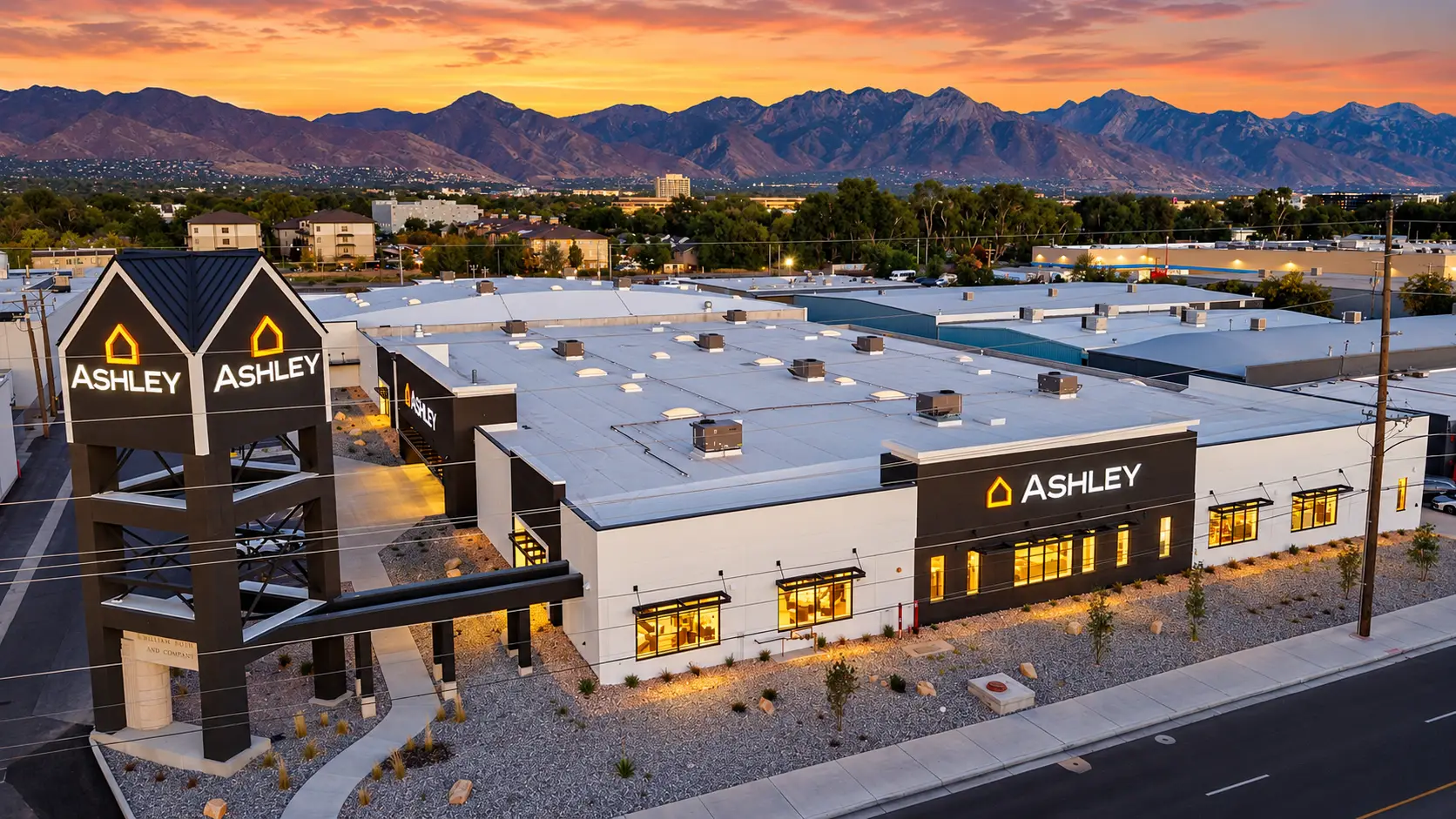 Ashley Furniture showroom in Salt Lake City, Utah, with the Wasatch Mountains in the background