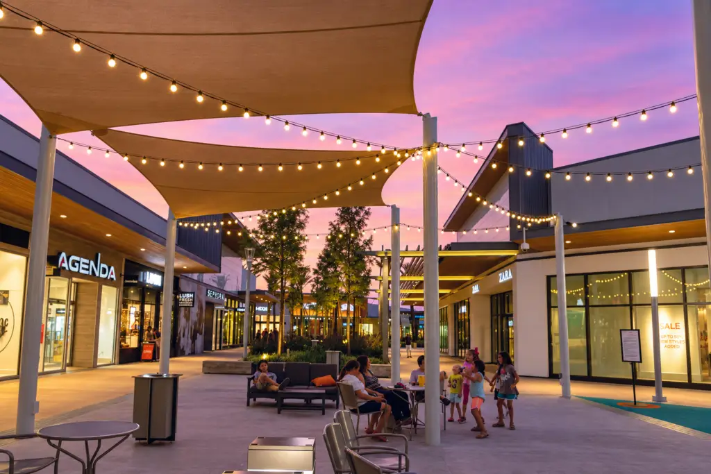 Baybrook Mall Friendswood outdoor play area with Luckey Climber and shaded seating