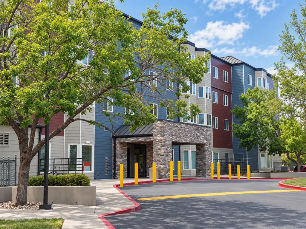 Renovated exterior of Decatur Place affordable housing community in Denver, Colorado