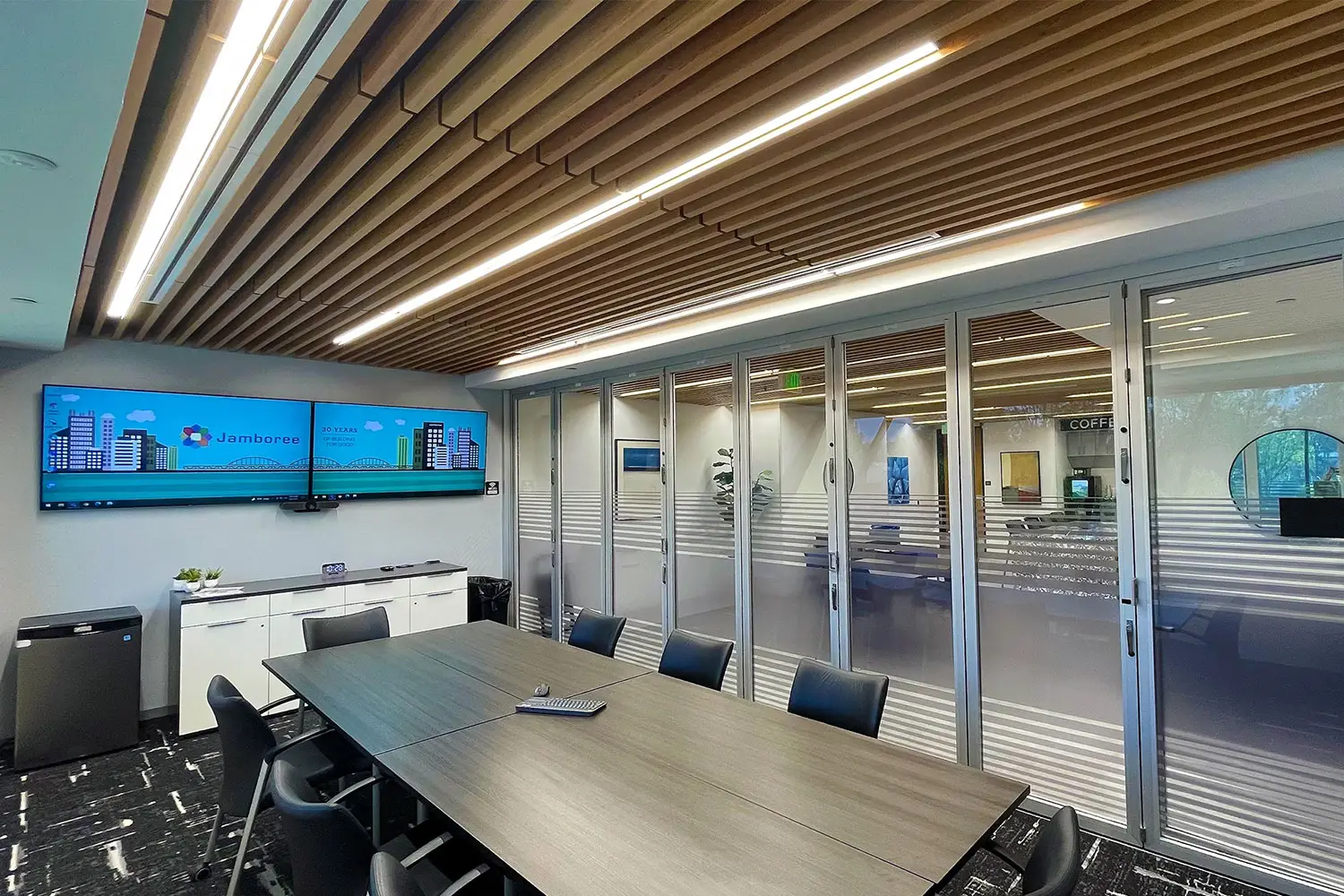 Jamboree Housing corporate office in Irvine, California, with contemporary workplace interiors designed by Architecture Design Collaborative.