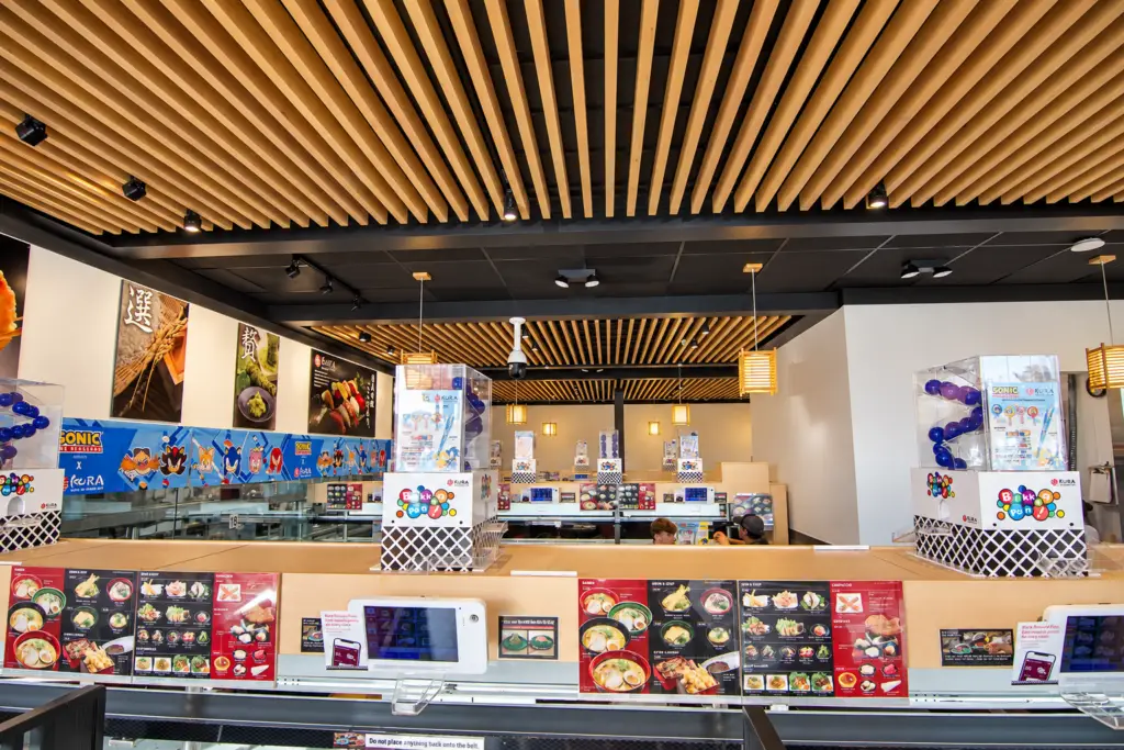 Kura Sushi in Katy, Texas, featuring the revolving sushi dining area designed by Architecture Design Collaborative