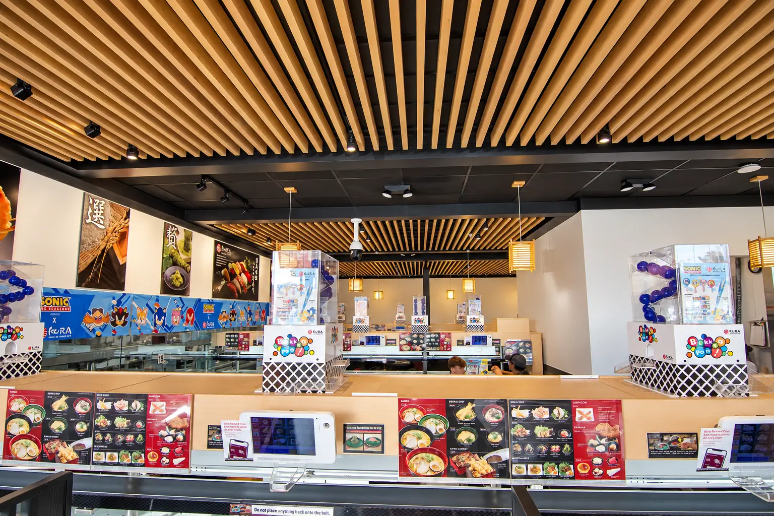 Kura Sushi in Katy, Texas, featuring the revolving sushi dining area designed by Architecture Design Collaborative