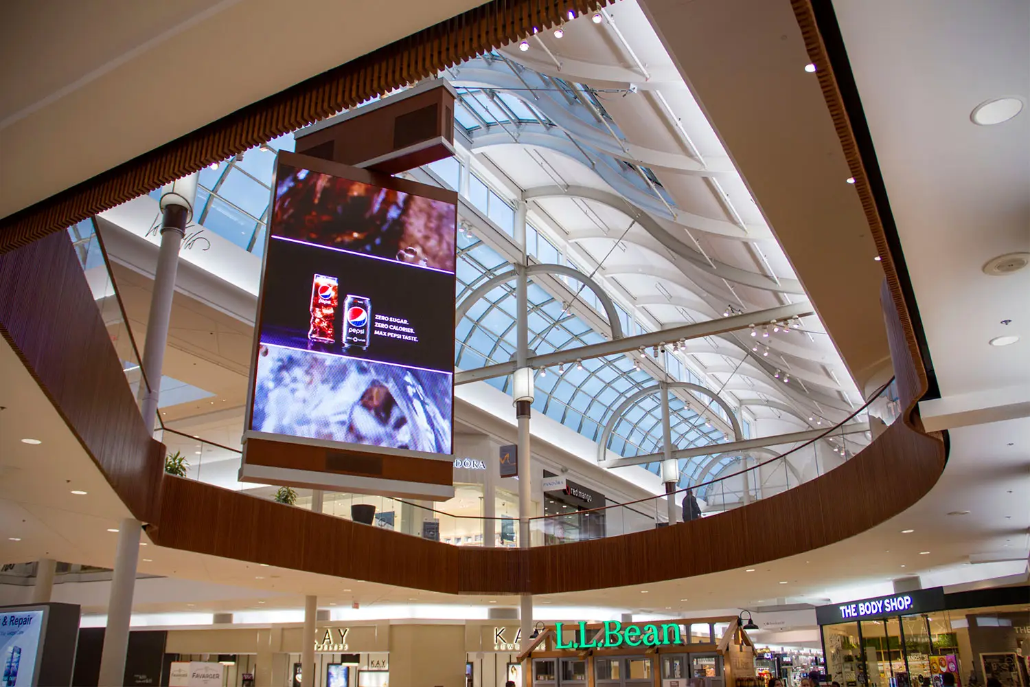 Double-sided rotating digital display at Natick Mall in Natick, Massachusetts, designed by Architecture Design Collaborative
