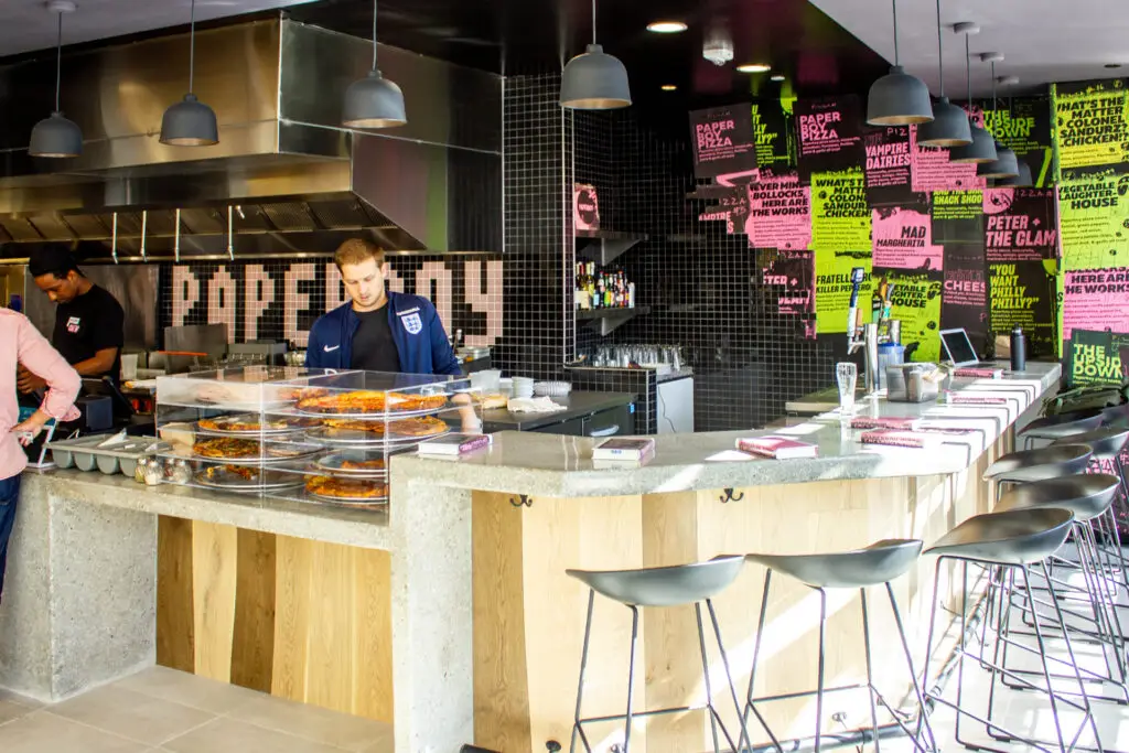 Paperboy Pizza interior at the Gallery Food Hall in Santa Monica, California, designed by Architecture Design Collaborative